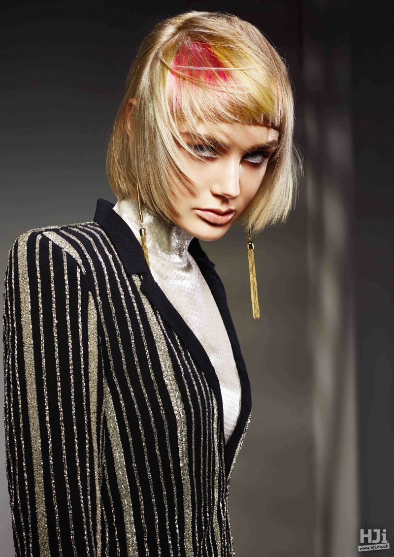 Blonde bob with short fringe and red panel colour