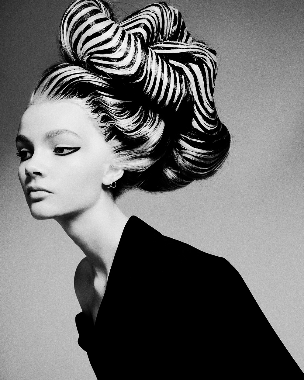 Jude McEwen  - BHA International Collection of the Year 2025 - Sculptural Bun with Black and White Twists