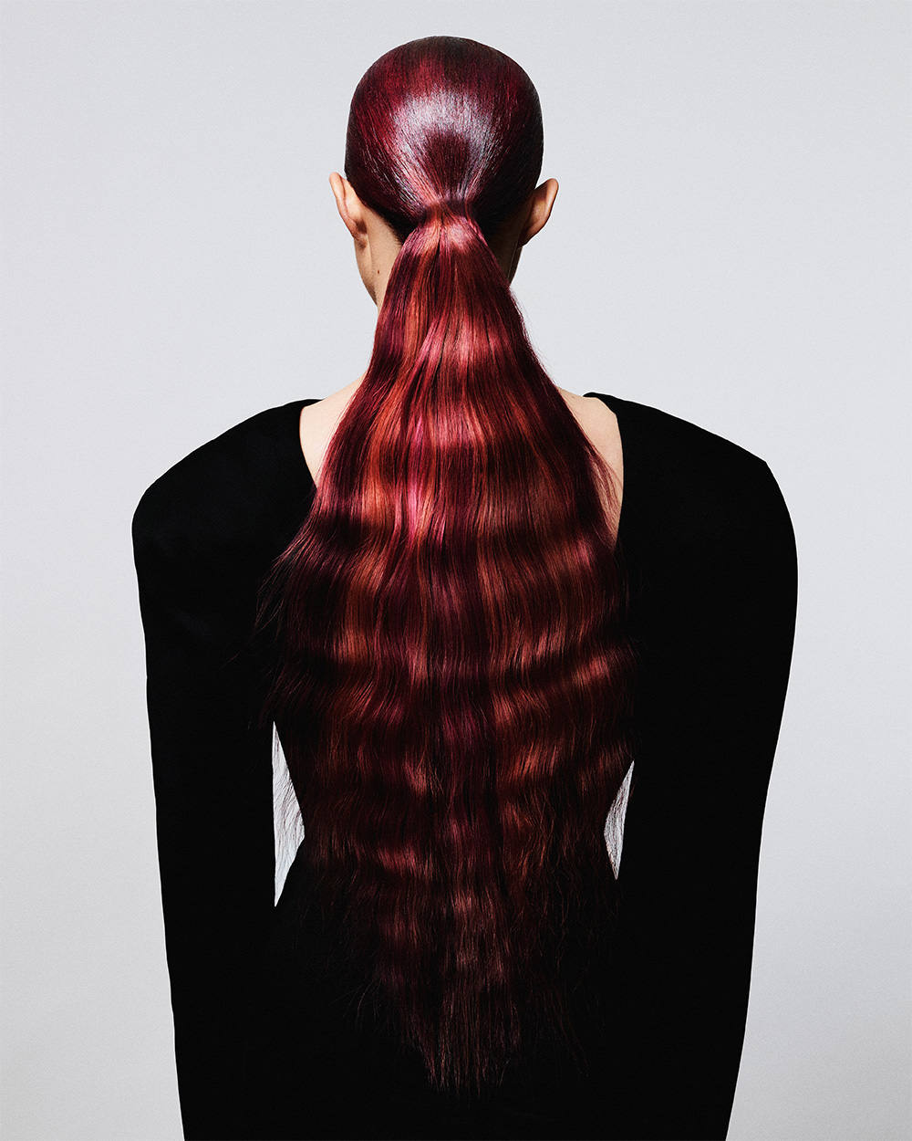 Sara Cester - BHA London Hairdresser of the Year 2025 - High, Sleek Vibrant Red Crimped Ponytail