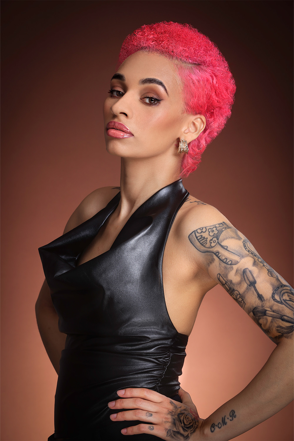 Tamara Robinson- BHA Midlands Hairdresser of the Year 2025 - Vibrant Pink Messy Cut and Curls