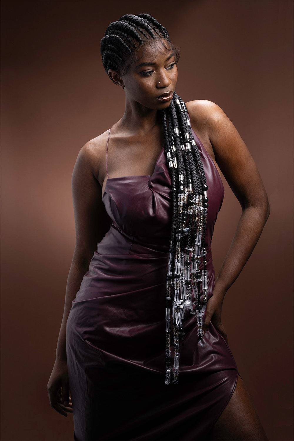 Tamara Robinson- BHA Midlands Hairdresser of the Year 2025 - Black Box Braids with Silver Beads and Charms Woven In