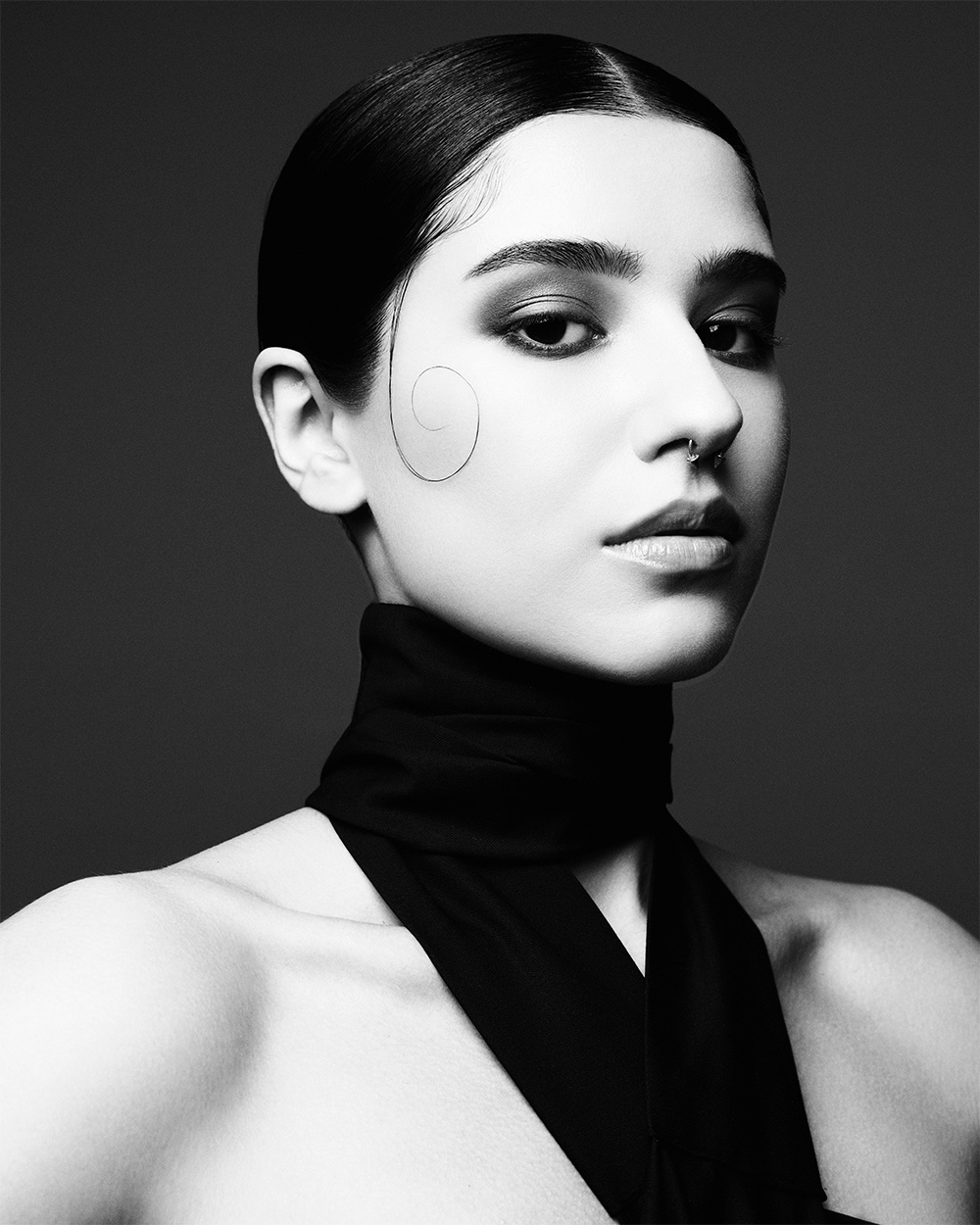 Nuru Perkins - BHA Midlands Hairdresser of the Year 2025 - Sleek, Tight Bun