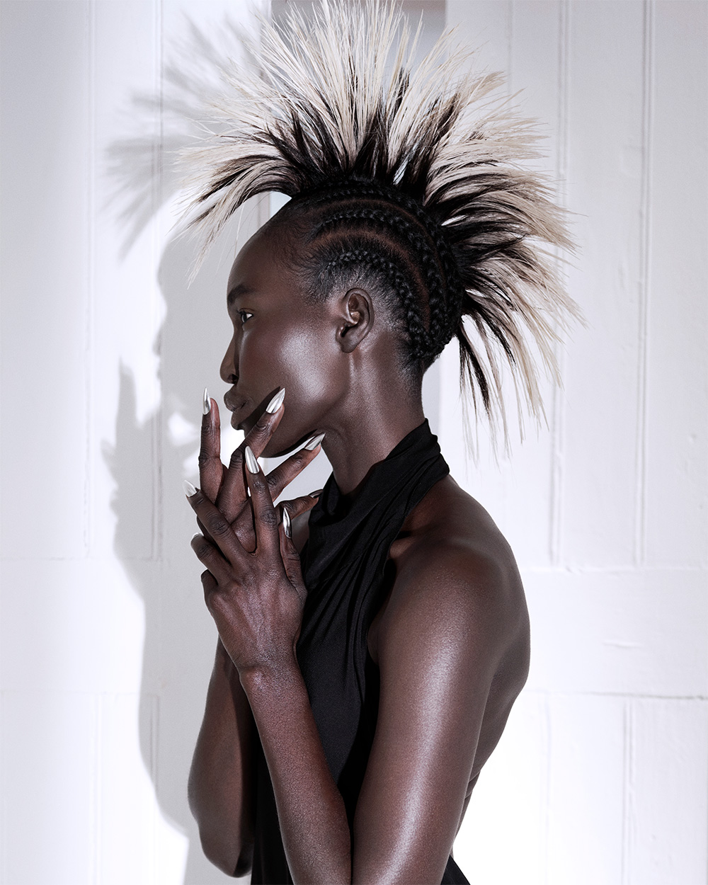James Earnshaw - BHA North Western Hairdresser of the Year 2025 - Mohawk with Braids on the Side in a Black and White High Contrast 