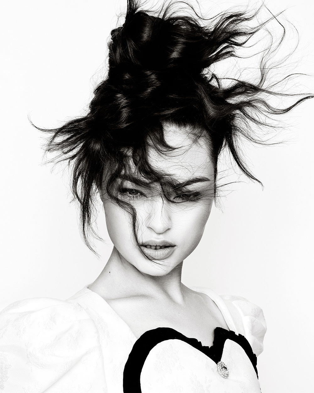 Laura and Ria Kulik - BHA North Western Hairdresser of the Year 2025 - Intricate, Messy Bun, with many Spiky and Textured Strands