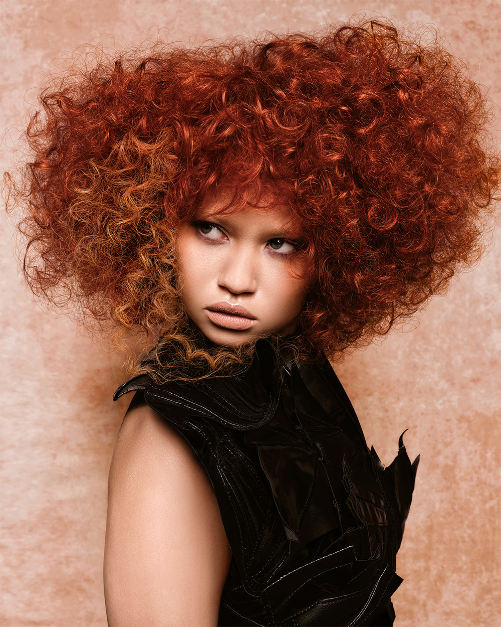 Michelle Summers Davies- BHA Wales and South West Hairdresser of the Year 2025 - Voluminous, Red and Orange Afro with a Curly Style