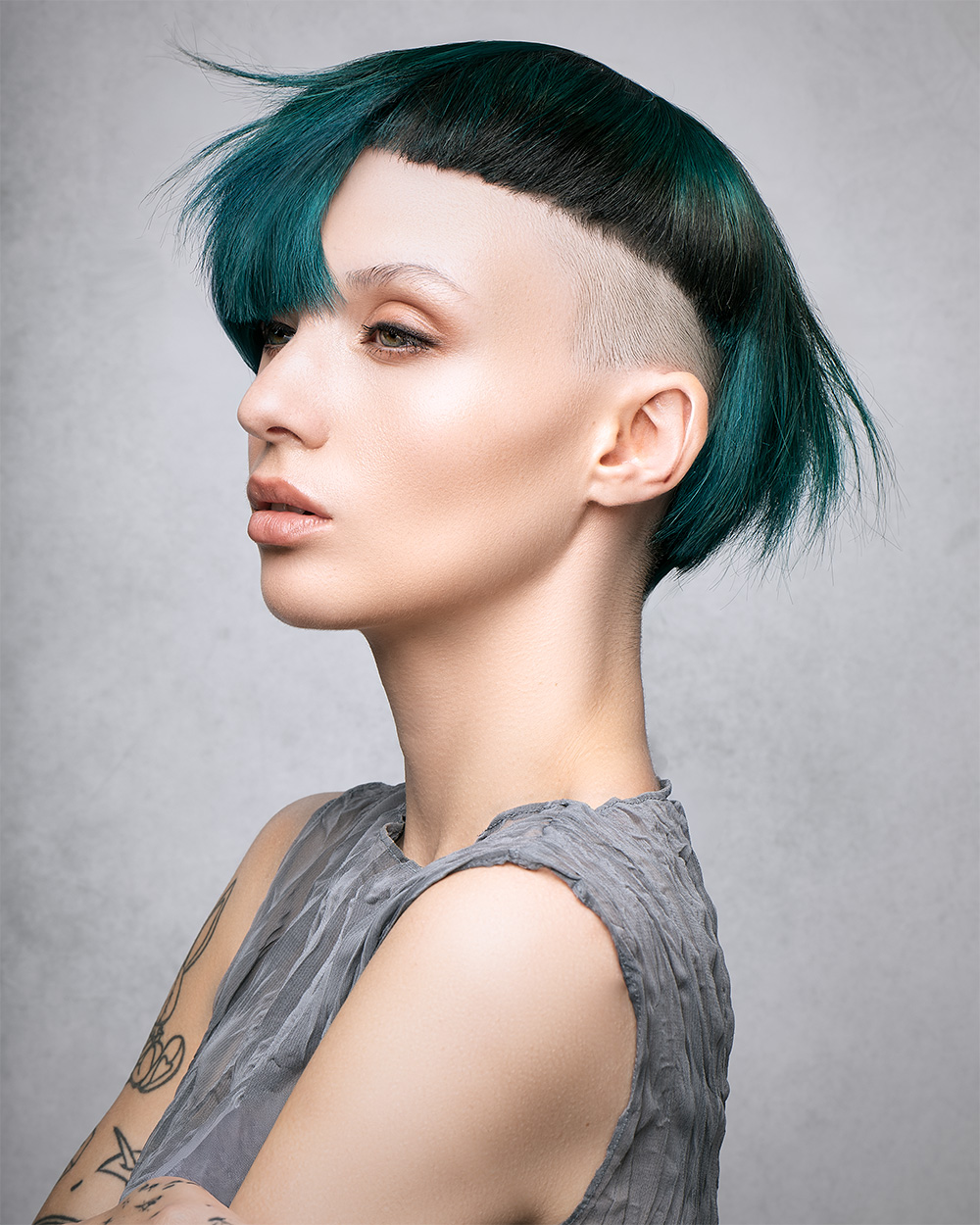 Josh and Sophie Goldsworthy - BHA Wales and South West Hairdresser of the Year 2025 - Side Undercut, Featuring a Teal Colour