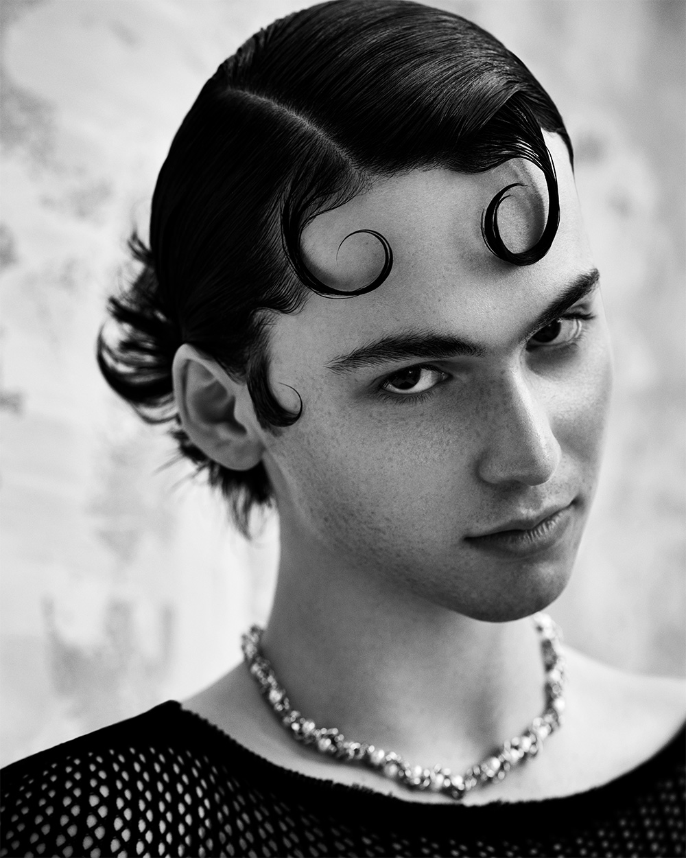 Jonathan Fisher - BHA Men's Hairdresser of the Year 2025 - Slick Hairstyle with Kiss Curls